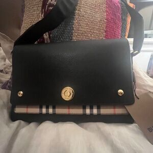 New (Floor Model) (Tags are present) Burberry Note Crossbody Bag. Black